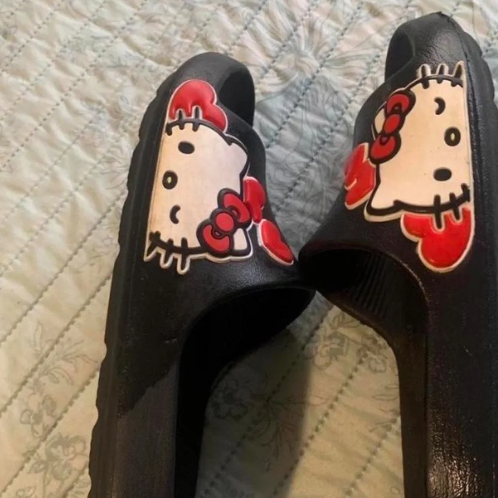 Sanrio Black Kids Hello Kitty Slide Sandals with Red and White Accents